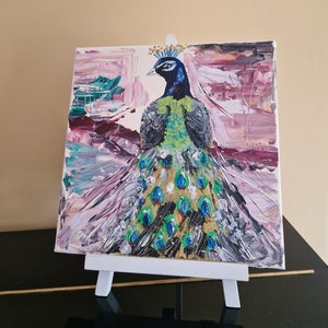 blue peacock painting on canvas