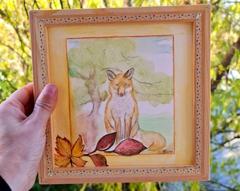 Red fox painting, wooden frame, watercolor animal illustration.