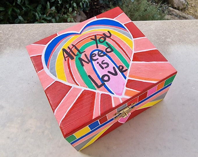 Square jewelry box decorated with hearts