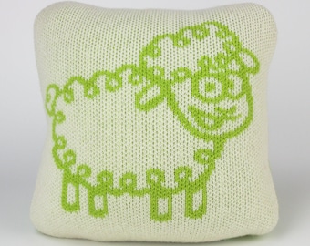 25cm knitted sheep cushion. Lime green & white merino lambswool. Handmade in UK.