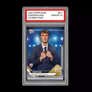 May include: A graded trading card featuring Cooper Flagg, the #1 draft pick, from the 2025 Topps Now series. The card is encased in a protective holder and graded GEM MT 10. The card has a photo of Cooper Flagg wearing a suit and tie.