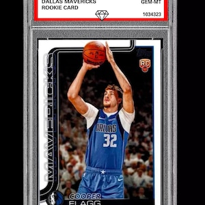 May include: A Cooper Flagg rookie card from the 2025-26 Topps series, graded 10 GEM-MT. The card features a photo of Flagg in a Dallas Mavericks uniform, mid-shot with a basketball. The card is encased in a protective holder.