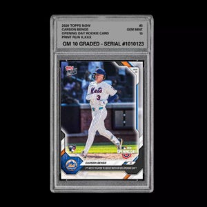 May include: A set of three ceramic mugs with a speckled, cream-colored glaze. Each mug features a different hand-painted design: a blue and green leaf, a yellow flower, and a red berry. The mugs have a simple, modern design.