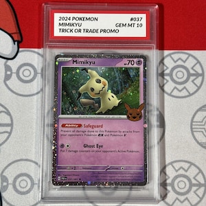 May include: A graded Pokémon card featuring Mimikyu from the 2024 Trick or Trade Promo set. The card has a purple border and features a cartoon illustration of Mimikyu. The card is graded GEM MT 10.