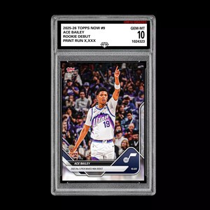 May include: A graded Ace Bailey rookie debut basketball card from the 2025-26 Topps Now series. The card features a photo of Bailey in a Utah Jazz uniform, with the number 19. The card is graded GEM-MT 10.
