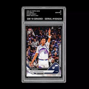 May include: A graded sports card featuring Ace Bailey in a Utah Jazz uniform, with the number 19. The card is encased in a protective holder, with text indicating it's a 2025-26 Topps Now Rookie Debut card, graded GM 10, serial number #1034234.