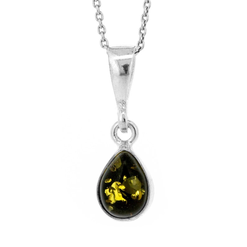 May include: A silver chain necklace with a teardrop-shaped pendant featuring a green amber stone.