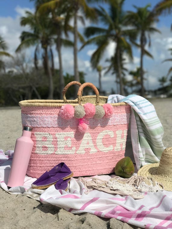 Straw beach basket with pom poms Etsy