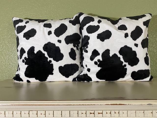 Fuzzy cow print pillow hotsell