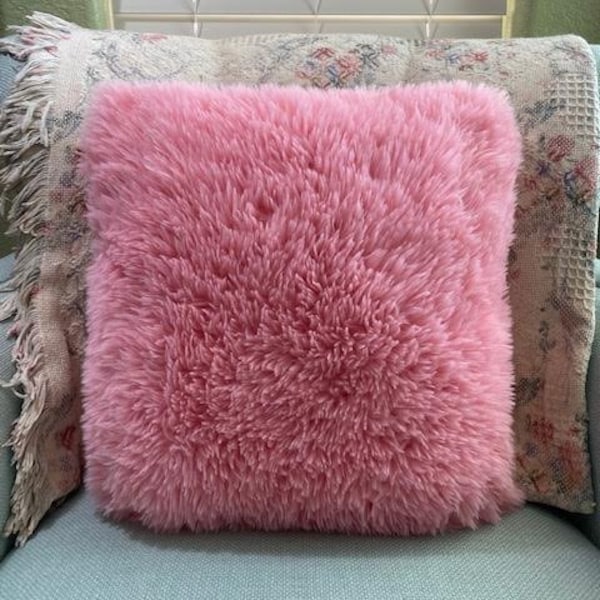 Faux fur pillow Measuring 15" x 15" Fluffy pink on the front as well as the back. Super cute pop of pink color anywhere you want it!