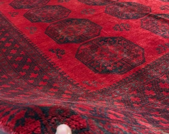 2 x 3 m Vintage Bokhara design Afghan Handmade rug with wool on a wool foundation in good condition.