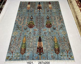High-quality, extremely soft wool of sheep hand-knotted Afghan rug in design of three of life.
