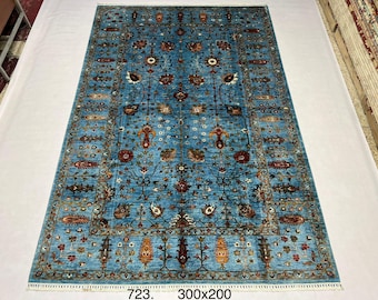 High-quality, extremely soft wool of sheep hand-knotted Afghan rug in design of three of life.