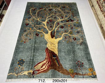 High-quality, extremely soft wool of sheep hand-knotted Afghan rug in design of three of life.