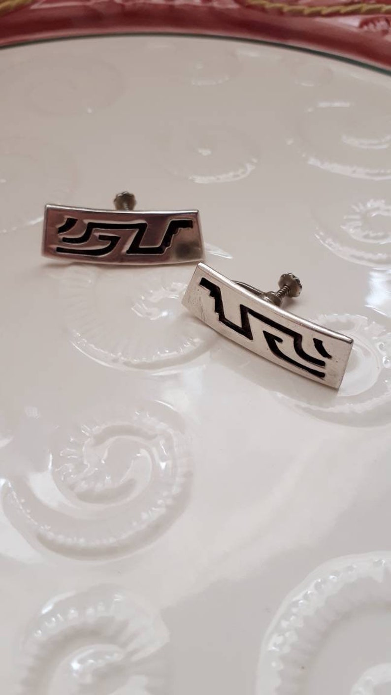 Designer piece. Hallmarked tribal aztec symbol screw back earrings Vintage 925 Mexican Taxco ATA oxidized sterling silver mayan symbol