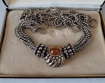 Collier vintage en faux ambre : chaîne boules argent et or bicolore, fermoir magnétique