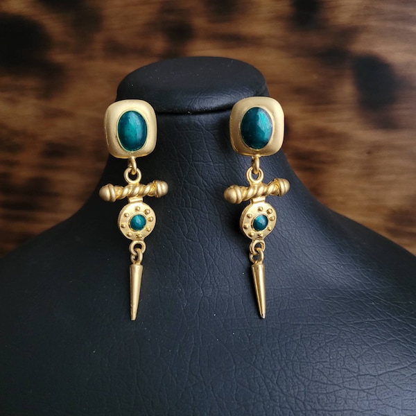Gold tone long dangle drop pierced earrings with dark green enameling. Gift idea