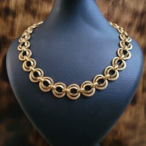 Vintage gold tone short length linked necklace. Gift idea