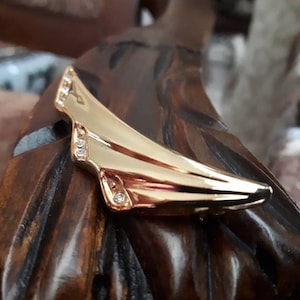 Vintage gold tone pin brooch with clear rhinestones. Gift idea.