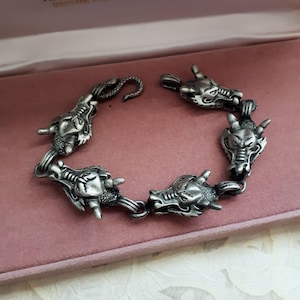 Bracelet vintage à maillons tête de dragon en étain : Bijoux unisexe