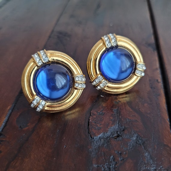 Vintage gold tone clip on earrings with cobalt bl… - image 1