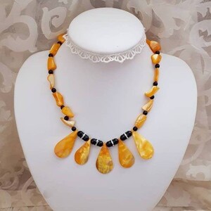 Marvelous died mother of pearl shimmery yellow orange beaded necklace. Gift idea.