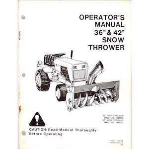 May include: Operator's manual for a 36" and 42" snow thrower. The manual features a black and white illustration of a snow thrower machine. The text "CAUTION: Read Manual Thoroughly Before Operating" is also included.