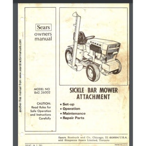May include: Black and white line drawing of a riding lawnmower with a sickle bar mower attachment. The image includes the text "SICKLE BAR MOWER ATTACHMENT" and "MODEL NO 842.26002".