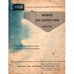 May include: A vintage manual cover for a Ford Mounted Side Delivery Rake, Series 503. The cover features the Ford logo and text detailing operating and assembly instructions. The manual is for 4 and 5 bar side delivery rakes with single or dual gauge wheels.
