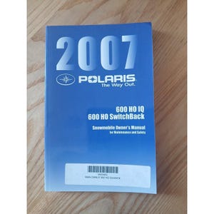 May include: A blue 2007 Polaris snowmobile owner's manual. The cover features the Polaris logo, the text "The Way Out," and model information for the 600 HO IQ and 600 HO SwitchBack models.