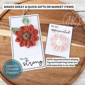 May include: Two crochet flower designs on white cards. The first card has a red flower with green leaves and the text "You are strong". The second card has a pink flower and the text "You are appreciated". Both cards have the text "Digital PDF Crochet Pattern".
