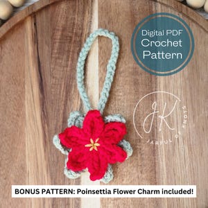 May include: A crochet pattern for a poinsettia flower ornament with a green loop for hanging. The pattern is a digital PDF download and includes a bonus pattern for a poinsettia flower charm. The text "Digital PDF Crochet Pattern" and "JARFUL OF KNOTS" is visible in the image.