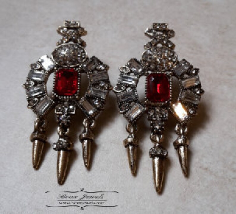 Red or Blue Claw Style Statement Earrings