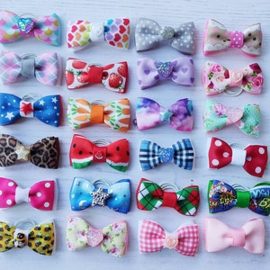 XS Dog Hair Bows 2 Pack you choose. Beautiful designs to choose from in 21 styles. Perfect for Toy dogs, 40mm or 1 3/4"