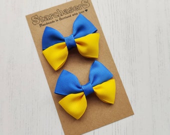 Small Ukraine flag Hair Bows on Clips, Pack of 2. 7cm Across. Includes fundraising donation.