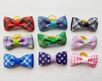 Tartan Dog Bows 2 Pack you choose. Beautiful designs to choose from in 24 styles. Perfect for small dogs Hair Or Collar.