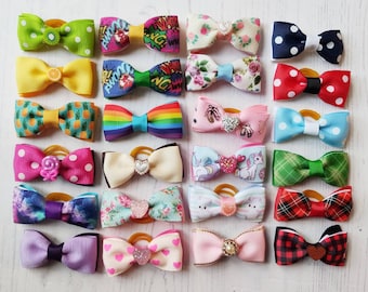 Dog Bows 2 Pack you choose. Beautiful designs to choose from in 24 styles. Perfect for small dogs Hair Or Collar.