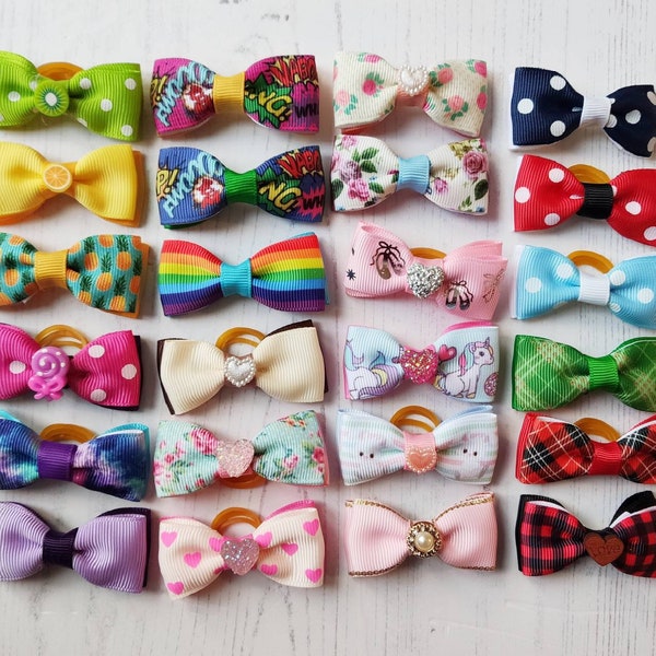 Dog Bows 2 Pack you choose. Beautiful designs to choose from in 24 styles. Perfect for small dogs Hair Or Collar.