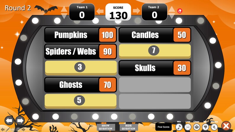 May include: A Halloween-themed game show scoreboard with two teams competing. Team 1 has a score of 0, while Team 2 has a score of 0. The overall score is 130. The categories for the game are Pumpkins, Spiders/Webs, Ghosts, Candles, Skulls, and an unknown category.  The game is in round 2.