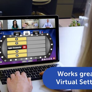May include: A laptop screen displaying a game show with a virtual audience, the game show is called "Light Fireworks" and the current round is round 2. The game show is being played on a laptop computer. The text "Works great in Virtual Settings" is displayed on a blue banner at the bottom of the image.