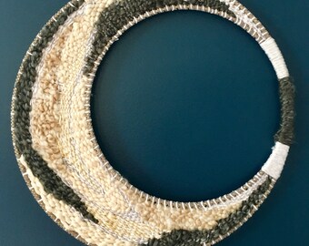 Luna creciente de fibras tejidas