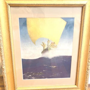 May include: A framed vintage print of a sailboat with a yellow sail, three figures on board, and a purple and blue ocean in the background.