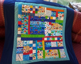 High quality unique quilt made of designer quality fabrics, lovingly color coordinated, finely stitched