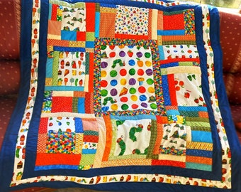 High-quality unique patchwork quilt made of designer quality fabrics, lovingly color-coordinated, finely quilted.