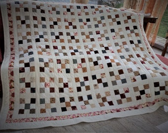 High-quality unique quilt made of designer quality fabrics, lovingly color coordinated, finely stitched