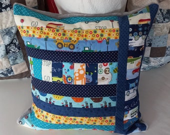 High-quality, unique patchwork cushion cover made from designer quality fabrics, lovingly coordinated in color, finely quilted!