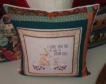 High-quality, unique patchwork cushion cover made from designer quality fabrics, lovingly color-coordinated and finely quilted!