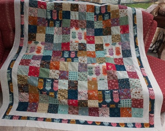 Elaborate high-quality unique patchwork quilt made of designer quality fabrics, lovingly color-coordinated, finely quilted