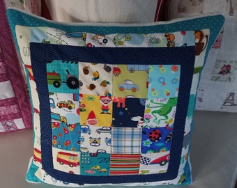 High-quality, unique patchwork cushion cover made from designer quality fabrics, lovingly coordinated in color, finely quilted!