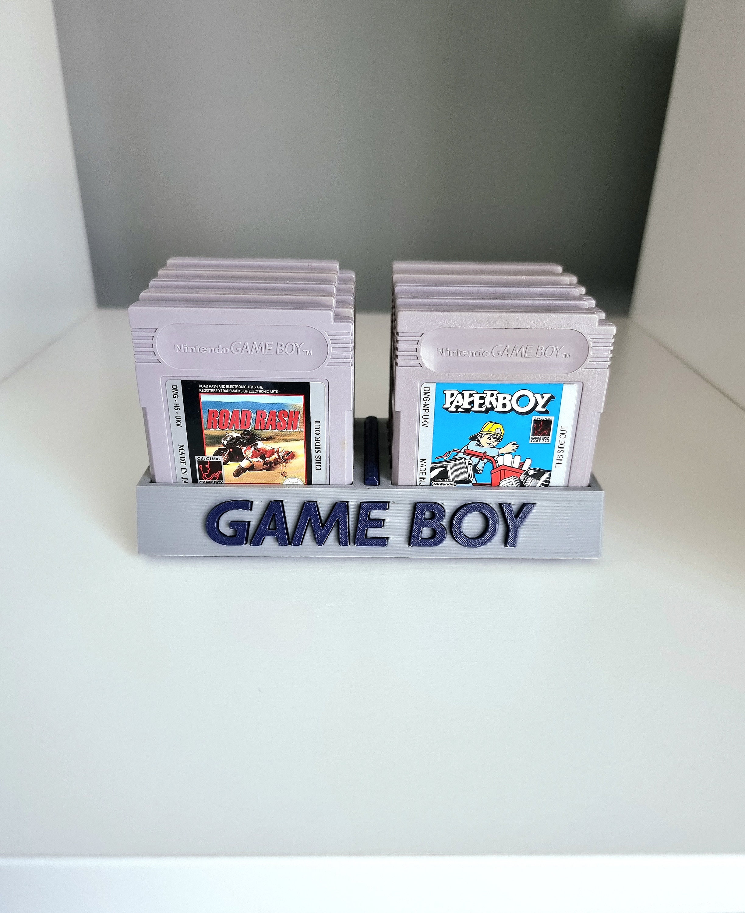 GAMEBOY ADVANCE STAND WITH 5X GAME CARTRIDGES HOLDER